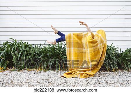 Caucasian woman in blanket falling outdoors View Large Photo Image Stock Photo - Caucasian woman in blanket falling outdoors. Fotosearch