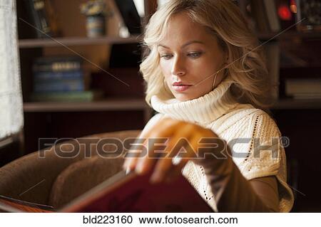 Caucasian woman reading book View Large Photo Image Stock Image - Caucasian woman reading book. Fotosearch