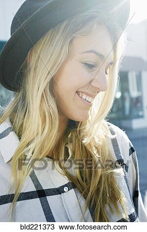 Caucasian woman smiling outdoors View Large Photo Image Stock Image - Caucasian woman smiling outdoors. Fotosearch