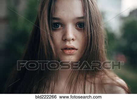 Caucasian woman standing outdoors View Large Photo Image Stock Photograph - Caucasian woman standing outdoors. Fotosearch