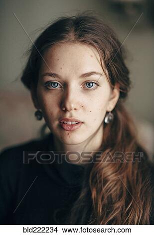 Picture - Caucasian woman with serious face. Fotosearch