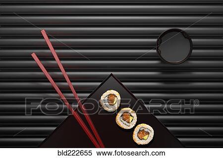 Stock Photography - Chopsticks and sushi on square plate with dipping sauce. Fotosearch