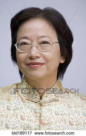 Close up of Asian woman in eyeglasses View Large Photo Image Stock Photo - Close up of Asian woman in eyeglasses. Fotosearch