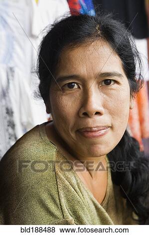 Stock Photo - Close up of Asian woman. Fotosearch