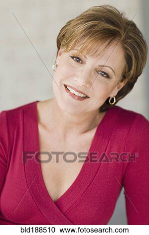Stock Image - Close up of Cuban woman smiling. Fotosearch