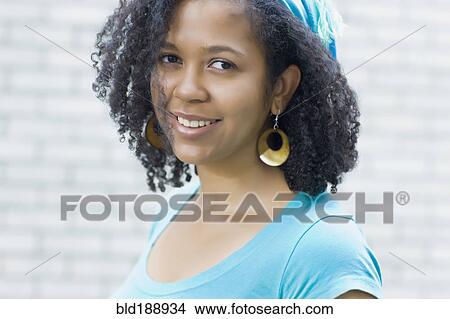Picture - Close up of glamorous mixed race woman. Fotosearch