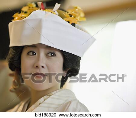 Stock Image - Close up of Japanese bride wearing traditional clothing. Fotosearch