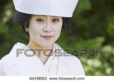 Close up of Japanese bride wearing traditional clothing View Large Photo Image Stock Image - Close up of Japanese bride wearing traditional clothing. Fotosearch