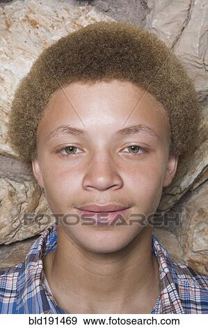 Close up of mixed race boy View Large Photo Image Stock Photo - Close up of mixed race boy. Fotosearch