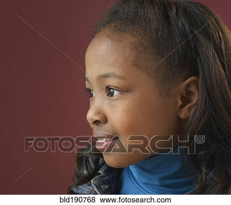 Stock Photo - Close up of mixed race girl. Fotosearch