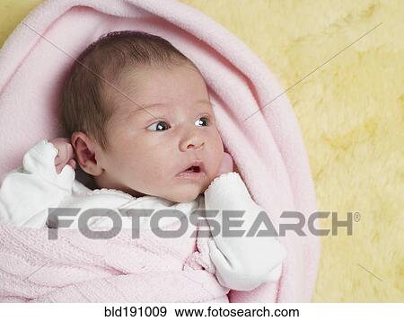 Close up of mixed race newborn baby View Large Photo Image Stock Photo - Close up of mixed race newborn baby. Fotosearch