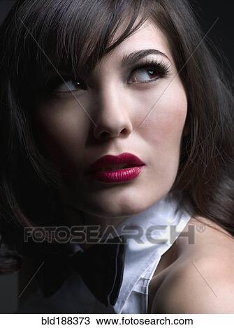 Close up of Mixed Race woman looking up View Large Photo Image Stock Image - Close up of Mixed Race woman looking up. Fotosearch