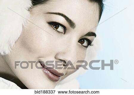 Stock Photo - Close up of Mixed Race woman smiling. Fotosearch