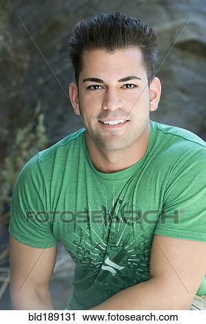 Close up of smiling Hispanic man View Large Photo Image Stock Image - Close up of smiling Hispanic man. Fotosearch