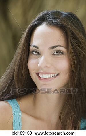 Close up of smiling Hispanic woman View Large Photo Image Stock Image - Close up of smiling Hispanic woman. Fotosearch