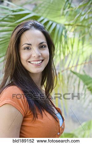 Close up of smiling Hispanic woman View Large Photo Image Stock Image - Close up of smiling Hispanic woman. Fotosearch