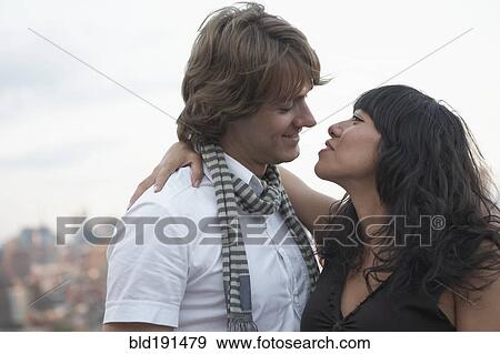 Stock Photo - Couple about to kiss. Fotosearch