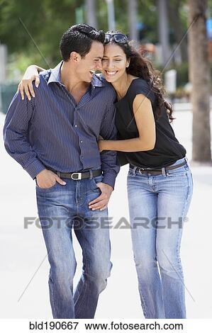 Stock Photo - Couple hugging. Fotosearch