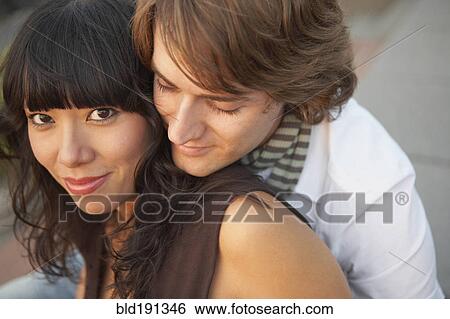 Stock Photograph - Couple hugging. Fotosearch