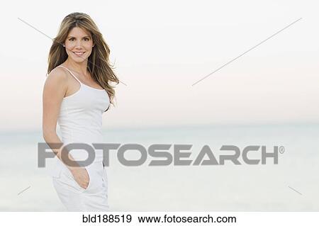 Cuban woman smiling at beach View Large Photo Image Stock Photo - Cuban woman smiling at beach. Fotosearch