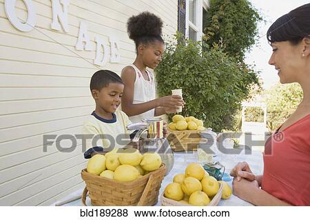 Stock Photo - Customer at lemonade stand. Fotosearch