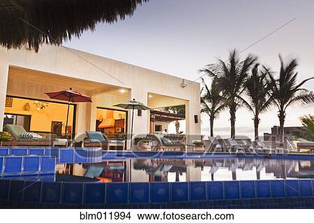 Elegant house and swimming pool View Large Photo Image Picture - Elegant house and swimming pool. Fotosearch