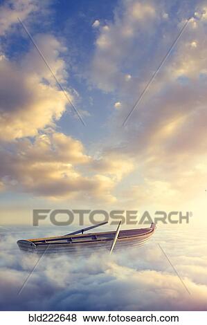Empty rowboat above clouds View Large Photo Image Stock Photo - Empty rowboat above clouds. Fotosearch