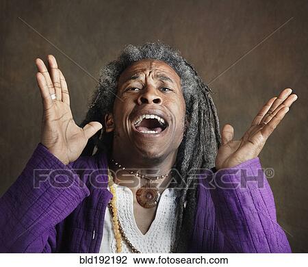 Exuberant African man with dreadlocks View Large Photo Image Stock Image - Exuberant African man with dreadlocks. Fotosearch