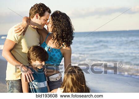 Family enjoying beach View Large Photo Image Stock Photo - Family enjoying beach. Fotosearch