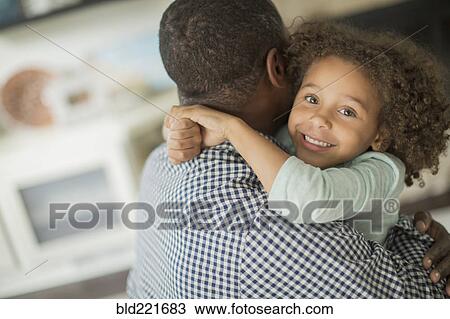 Father and daughter hugging View Large Photo Image Stock Image - Father and daughter hugging. Fotosearch