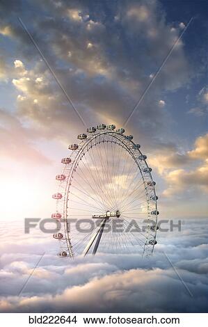 Ferris wheel above clouds View Large Photo Image Picture - Ferris wheel above clouds. Fotosearch