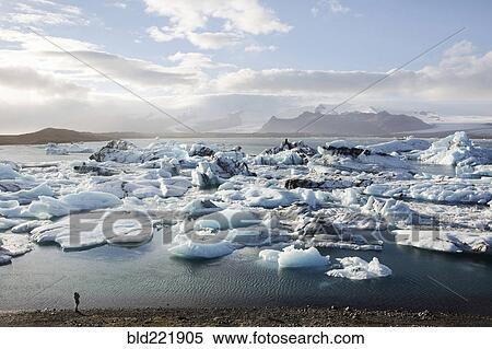 Stock Photography - Glaciers floating near shore. Fotosearch