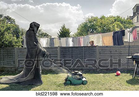 Grim Reaper mowing backyard View Large Photo Image Stock Photo - Grim Reaper mowing backyard. Fotosearch