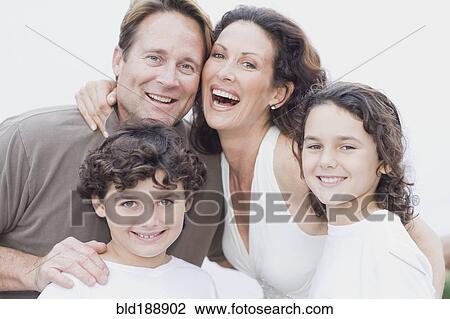 Happy family posing for portrait View Large Photo Image Stock Image - Happy family posing for portrait. Fotosearch