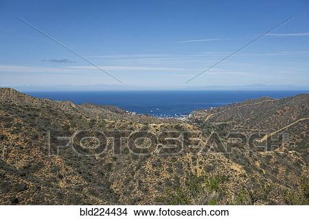 Picture - Hills overlooking ocean. Fotosearch