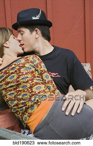 Stock Image - Hispanic couple kissing. Fotosearch