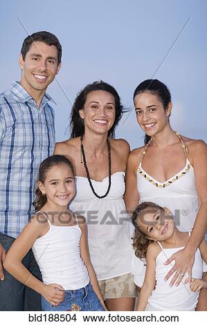 Picture - Hispanic family posing. Fotosearch