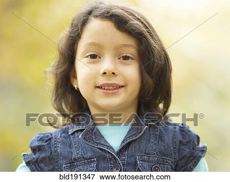 Hispanic girl smiling View Large Photo Image Stock Photo - Hispanic girl smiling. Fotosearch