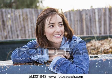 Hispanic woman sitting in truck bed View Large Photo Image Stock Image - Hispanic woman sitting in truck bed. Fotosearch