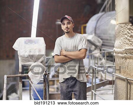Hispanic worker in factory View Large Photo Image Stock Image - Hispanic worker in factory. Fotosearch
