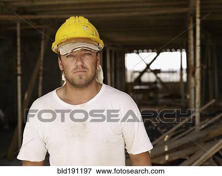 Hispanic worker on construction site View Large Photo Image Stock Photo - Hispanic worker on construction site. Fotosearch