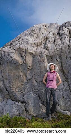 Japanese woman leaning on rock formation View Large Photo Image Stock Photography - Japanese woman leaning on rock formation. Fotosearch