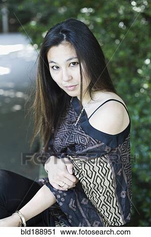 Japanese woman wearing fashionable clothing View Large Photo Image Stock Image - Japanese woman wearing fashionable clothing. Fotosearch