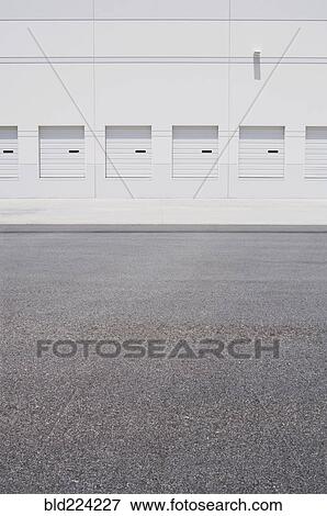 Loading docks and empty parking lot View Large Photo Image Stock Photo - Loading docks and empty parking lot. Fotosearch