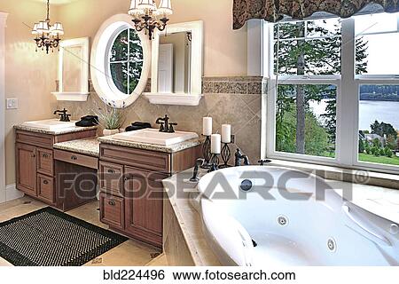 Luxury bathtub in modern bathroom View Large Photo Image Stock Photograph - Luxury bathtub in modern bathroom. Fotosearch