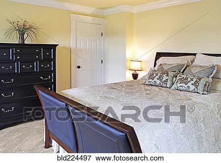 Luxury bed in modern bedroom View Large Photo Image Stock Photo - Luxury bed in modern bedroom. Fotosearch