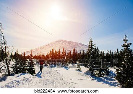 Man hiking on mountain in winter View Large Photo Image Picture - Man hiking on mountain in winter. Fotosearch