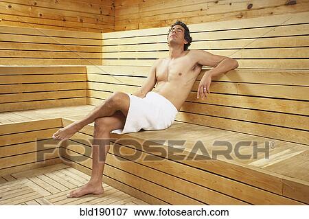 Stock Photo - Man relaxing in sauna. Fotosearch