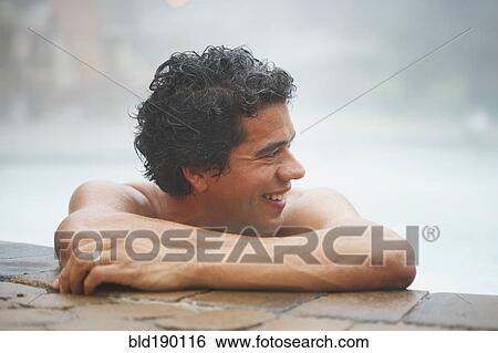 Man sitting in hot tub View Large Photo Image Stock Photograph - Man sitting in hot tub. Fotosearch