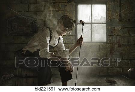 Man smoking cigarette with golf club View Large Photo Image Stock Image - Man smoking cigarette with golf club. Fotosearch